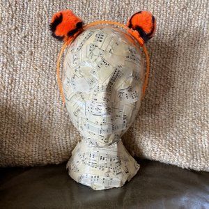 Handcrafted pom pom headband. Tiger on orange.  New!